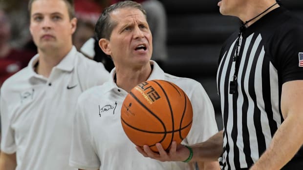 Arkansas coach Eric Musselman voices frustration during the Razorbacks' historic loss to Auburn.